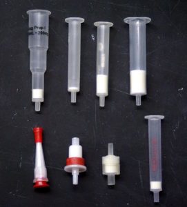 a number of solid phase extraction columns of different sizes 