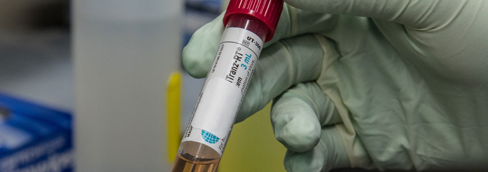 Test tube with viral transport media sent to a laboratory for COVID-19 testing by PCR.
