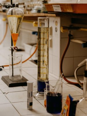 Liquid-Liquid extraction being done in a lab. This process helps make reports on Extractable and Leachable compounds in water. A valuable technique for environmental science and product safety.